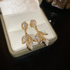 Wholesale Light Luxury French Retro Style Copper Leaf Zirconia Tassel Earrings For Women