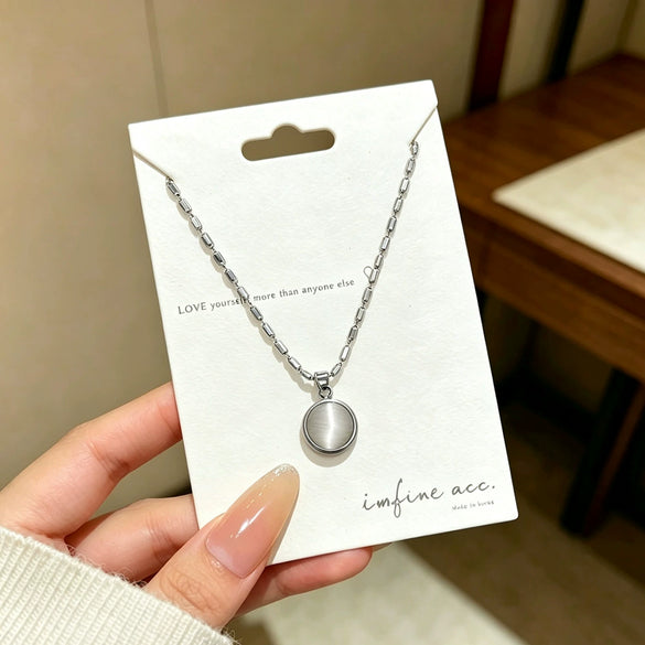 Wholesale Light Luxury Geometric Titanium Steel Cat's Eye Stone Round Pendant Necklace With Rice Chain For Women Real Gold Plated