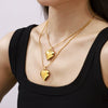 Wholesale Light Luxury Heartshaped Hollow Titanium Steel Pendant Clavicle Chain Necklace Plated 18K Gold For Women