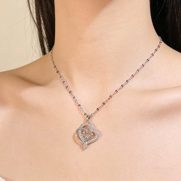 Wholesale Light Luxury Heartshaped Zircon Inlaid Copper Pendant Titanium Steel Water Wave Chain Necklace For Elder Women