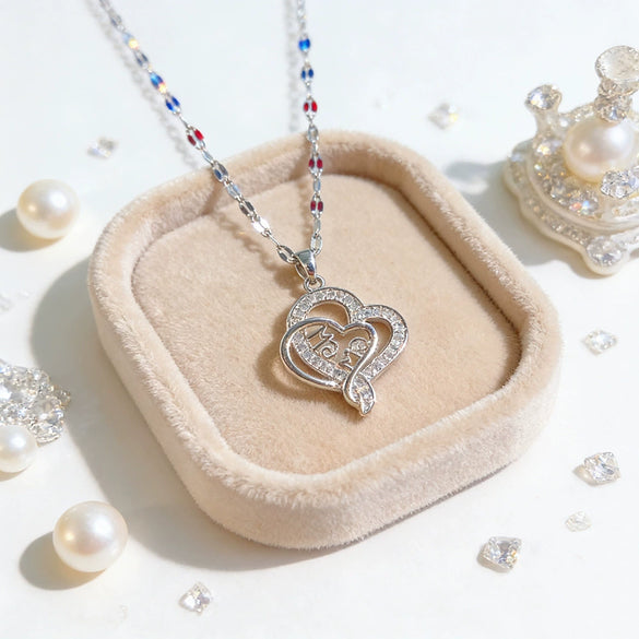 Wholesale Light Luxury Heartshaped Zircon Inlaid Copper Pendant Titanium Steel Water Wave Chain Necklace For Elder Women