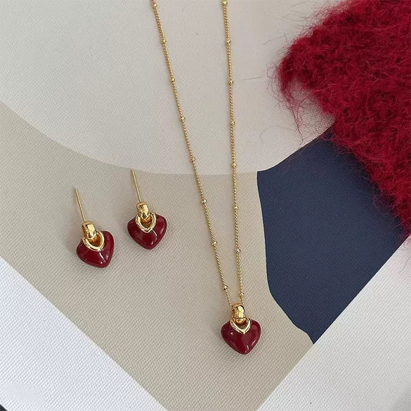 Wholesale Light Luxury Style Titanium Steel And Copper Heart Water Drop Bell Pattern Electroplated Earrings And Necklaces Set For Women