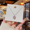Wholesale Light Luxury Titanium Steel Women's Heart Pendant Necklace With Inlaid Zircon And Mixed Gem Inlay