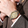 Wholesale Men's Fashionable Quartz Watch With Alloy Case Steel Strip Strap Round Dial And Rome Scale