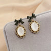 Wholesale Metal Alloy Cat's Eye Earrings With Geometric Pattern Retro Exaggerated Style For Women