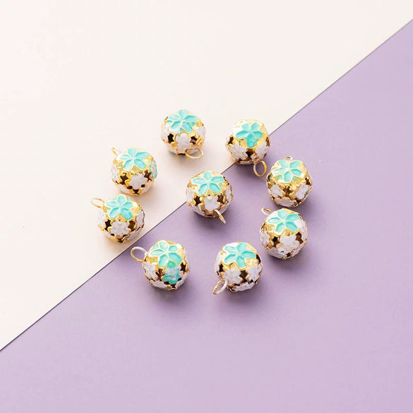 Wholesale Metal Bracelet With Color Hollow Flower Ball And Pet Bell Cloisonne And Electroplated Design