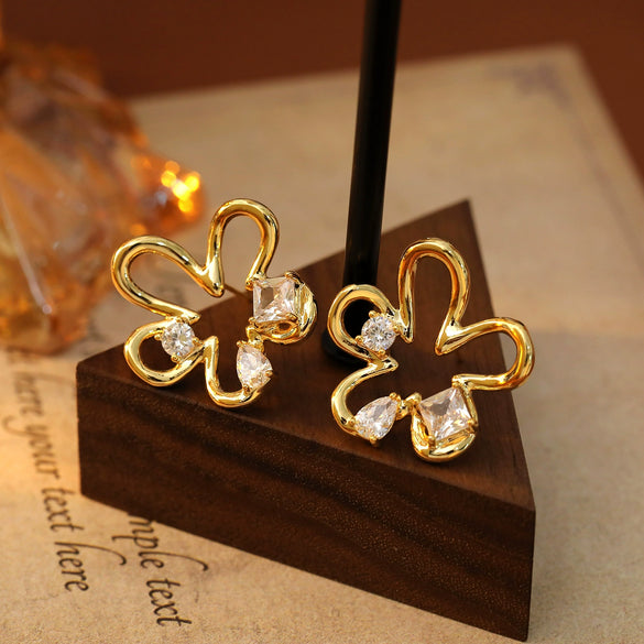 Wholesale Metal Copper Geometric And Flower Hollow Earrings Electroplated Light Luxury Style For Women