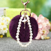 Wholesale Metal Flower Keychain Pendant For Female Plush And Cute Design