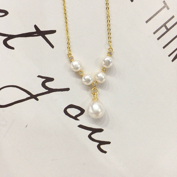 Wholesale Minimalist Freshwater Pearl Pendant Jewelry With Copper Accessories And Flat Round Bun Round Pearls