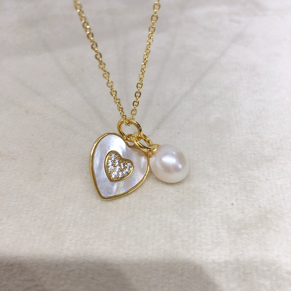 Wholesale Minimalist Freshwater Pearl Pendant Necklace With Copper Accessories Microinlaid Zircon Love Sea Shell Shape
