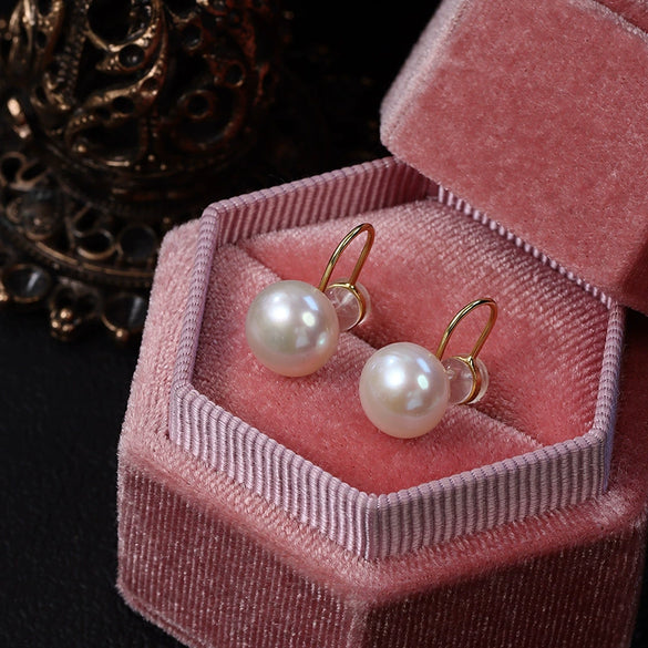 Wholesale Minimalist Unisex Steamed Bun Round Natural Freshwater Pearl S925 Silver Painless Ear Clip With Silicone Ear Buckle
