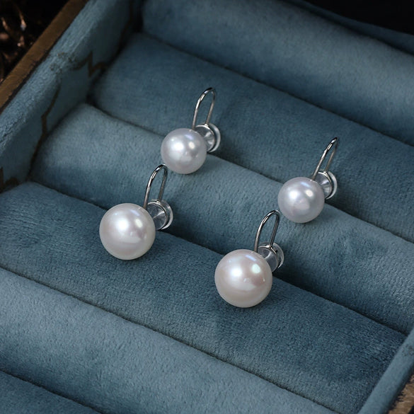 Wholesale Minimalist Unisex Steamed Bun Round Natural Freshwater Pearl S925 Silver Painless Ear Clip With Silicone Ear Buckle