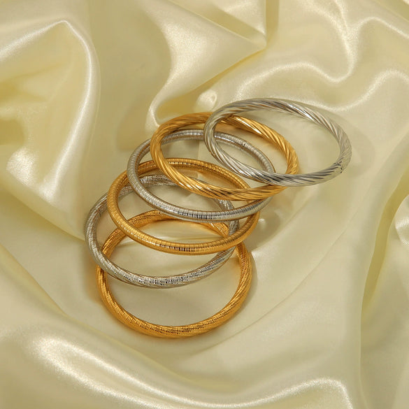 Wholesale Minimalistic Spiral Design Stainless Steel Bracelet Jewelry With Vacuum Real Gold Electroplating In Pvd Furnace