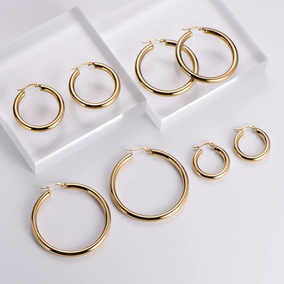 Wholesale Modern Style Exquisite Stainless Steel Polished 18K Gold Plated Thick Round Wire Hollow Large Hoop Earrings With Geometric Design