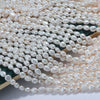 Wholesale Naked Freshwater Pearls Doublesided Light Baroque Shaped String