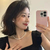 Wholesale Natural Freshwater Pearl Earrings With S925 Sterling Silver Needle And Oblate Shape
