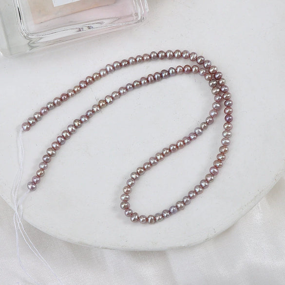 Wholesale Natural Freshwater Pearl Eggshaped String Jewelry Purple