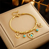 Wholesale Niche Creative Fashion Hollow Heart Pendant Chain Titanium Steel Jewelry With Blue Eyes Electroplated Unisex Bracelet
