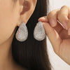 Wholesale Niche Style Drop Shape Titanium Steel 18K Gold Plated Earrings For Women