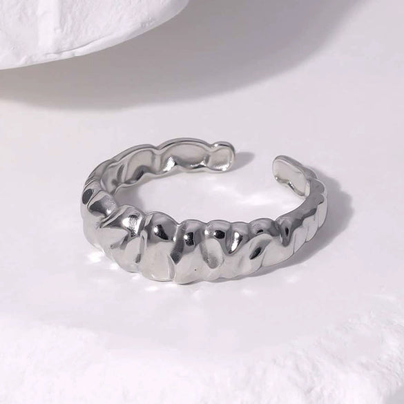 Wholesale Open Female Titanium Steel Ring With Irregular Random Pattern And Gold Plated Electroplating