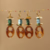 Wholesale Oval Resin And Stainless Steel Geometric Pig Nose Earrings For Women With Electroplating Design