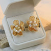 Wholesale Pearl Flower Earrings And Ear Cuffs Retro Metallic Electroplating Style