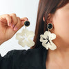 Wholesale Plastic Resin Flower Cut Out Multilayered Women's Light Luxury Style Earrings With Polish Design