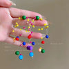 Wholesale Plastic Resin Handmade Flower Tassel Earrings With Silver Needle In Small Fresh Style