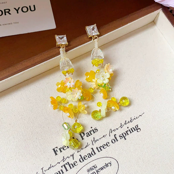 Wholesale Plastic Resin Handmade Flower Tassel Earrings With Silver Needle In Small Fresh Style