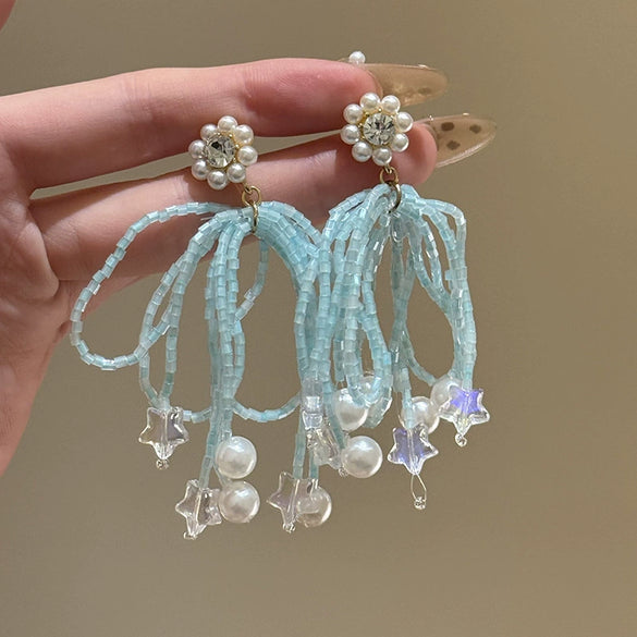 Wholesale Plastic Resin Handmade Flower Tassel Earrings With Silver Needle In Small Fresh Style