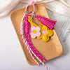 Wholesale Pu Leather Plants Flowers Pattern Semimanual Small Flower Tassel Pendant Car Keychain And Bag Pendant