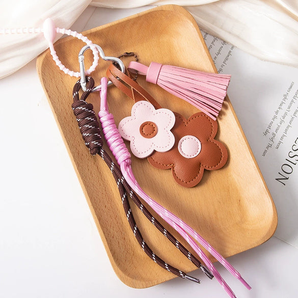 Wholesale Pu Leather Plants Flowers Pattern Semimanual Small Flower Tassel Pendant Car Keychain And Bag Pendant
