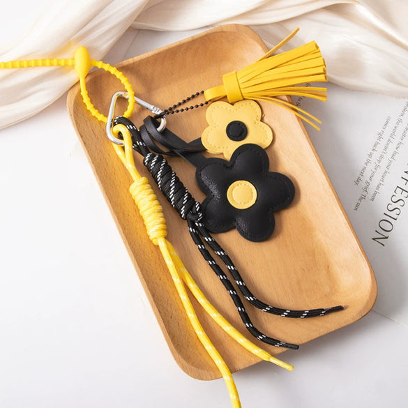 Wholesale Pu Leather Plants Flowers Pattern Semimanual Small Flower Tassel Pendant Car Keychain And Bag Pendant