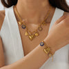 Wholesale Retro Goldplated Stainless Steel Jewelry Set With Heart Water Drop And Bell Patterns For Women