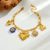 Wholesale Retro Goldplated Stainless Steel Jewelry Set With Heart Water Drop And Bell Patterns For Women