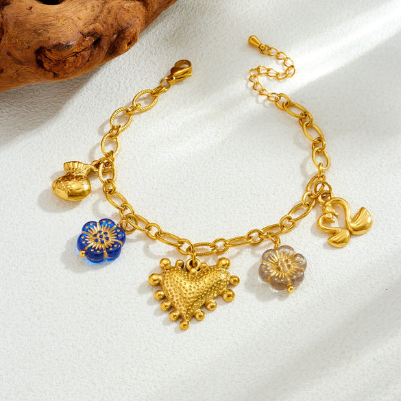 Wholesale Retro Goldplated Stainless Steel Jewelry Set With Heart Water Drop And Bell Patterns For Women