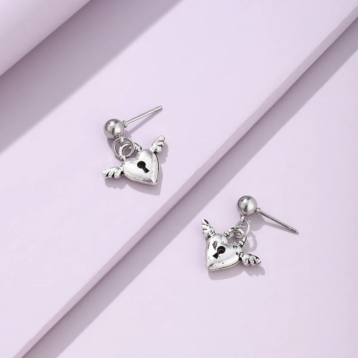 Retro Heart Plating Alloy No Inlaid Earrings