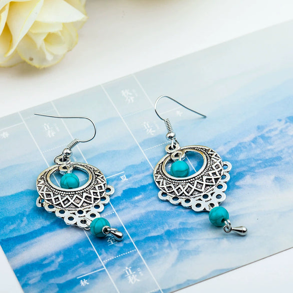 Wholesale Retro Hollow Turquoise Water Drop Earrings With Bohemian Tassels Alloy Electroplated Jewelry For Women