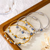 Wholesale Retro Luxury Geometric Devil's Eye Oil Drop Bracelet Encrusted With Diamonds Titanium Steel 18K Gold Plated