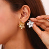 Wholesale Retro Popular Women's Stainless Steel Earrings 18K Gold Plated Casting Three Dimensional Flower Studs Electroplated