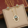 Wholesale Retro Stainless Steel Oil Dropping Eyes Palm Necklace Set With Electroplating Treatment
