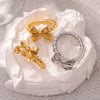 Wholesale Ring 316L Stainless Steel Gold Plated Bow Geometric Design