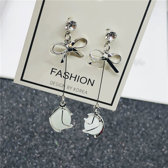 Wholesale S925 Silver Needle Long Opal Bow Ear Stud Earrings With Geometric Pattern And Electroplating
