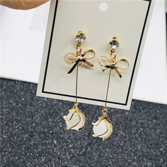 Wholesale S925 Silver Needle Long Opal Bow Ear Stud Earrings With Geometric Pattern And Electroplating