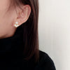Wholesale S925 Silver Women's Minimalist Pearl Earrings With Flat Round And Oblate Shapes