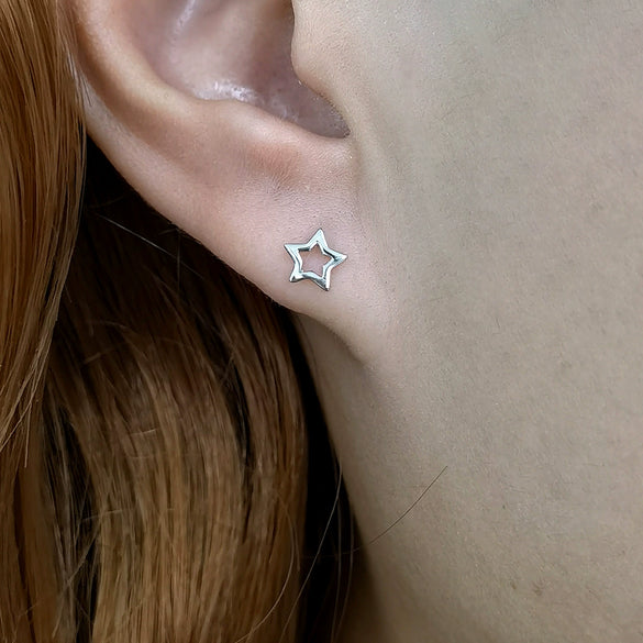 Wholesale S925 Sterling Silver Hollow Fivepointed Star Earrings With Electroplating For Women Simple And Fashionable Ear Jewelry