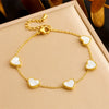 Wholesale Shell Love Retro Temperament Stainless Steel Clavicle Chain Earrings Necklace Bracelet Set With Electroplating And Love Water Drops Bells Pattern For Women