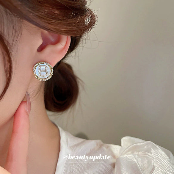 Wholesale Silver Needle Earrings With Real Gold Electroplated Metal Letter Pattern Light Luxury Style