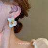 Wholesale Silver Needle Earrings With Real Gold Plating And Pleated Flower Design For Women Made Of Alloy