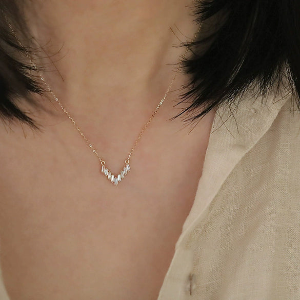 Wholesale 225 Silver Vshaped Women's Light Luxury Necklace With Small Skirt Pendant Inlaid With Square Zircon And Plated With 14K Gold And Chain With Letters Numbers Text Pattern